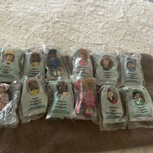 Bundle of 12 Auth. Mini Madame Alexander Dolls a couple duplicates